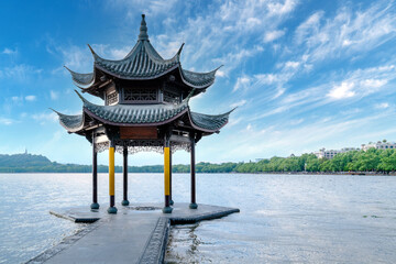Naklejka premium chinese ancient pavilion on the west lake in hangzhou.Translation: