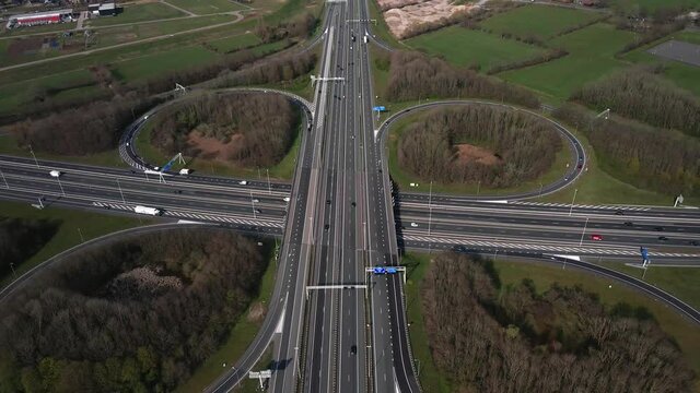Knooppunt Hoevelaken in the shape of a clover aerial drone view. Intersection of the A28 and A1 highway The Netherlands.