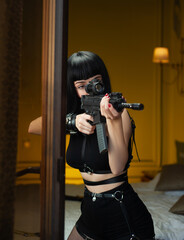 Fototapeta na wymiar a female hitman in a hotel near the window aims an automatic rifle with a telescopic sight at the victim committing murder
