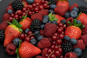 Raspberry, blackberry and blueberry background. Close up. Top view.