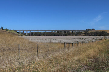 The historic 440-metre long Moorabool Viaduct (1862) is a bluestone and iron bridge that was built to carry the Geelong-Ballarat railway over the river valley