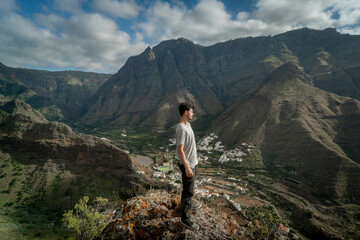 young man contemplates the landscape. Agaete valley. gran canaria