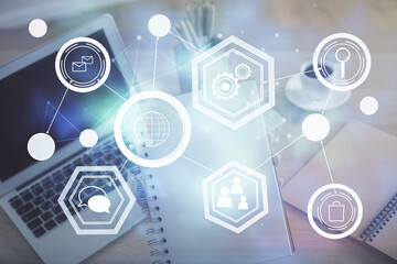 Double exposure of woman hands typing on computer and social network theme hologram drawing. People media concept.