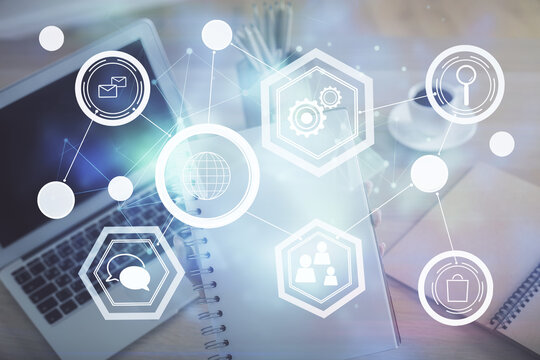 Double exposure of woman hands typing on computer and social network theme hologram drawing. People media concept.