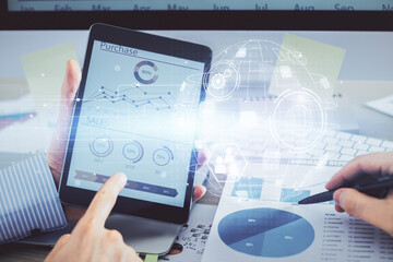 Double exposure of man's hands holding and using a phone and social network theme drawing.