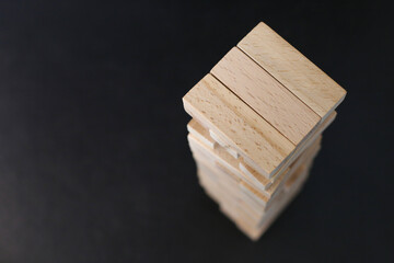 Closeup image of a Jenga or Tumble tower wooden block game