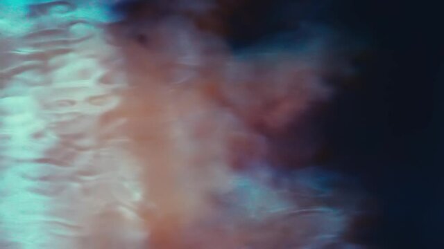 Hydrology. Water pollution, roiling (fluid) mechanics. Jets of cloudy turbide water penetrate into a clean pond and you can see swirls of mud (phase separation, mixing) current