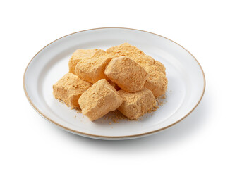 Warabi mochi placed on a white background