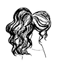 A girl with long curly hair pulled back in a ponytail