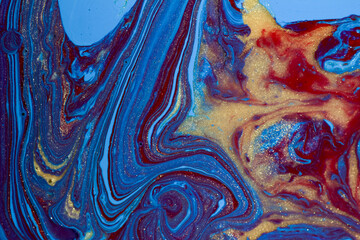 Acrylic of red, blue and gold colors that form beautiful waves and waves. It is shaped like a river...