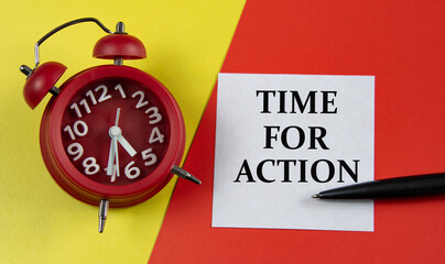 TIME FOR ACTION - words on a white sheet on a multi-colored background with an alarm clock and a pen