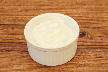Obraz na płótnie Canvas Sour cream in the bowl
