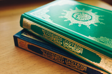 Close up two Qurans is holy books in Islam on the table in the sunlight