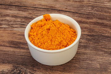 Tumeric powder in the bowl