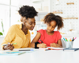 homework teaching education mother children daughter familiy childhood child teacher classroom black african american
