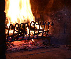 fireplace with warm lit fire symbol of the warmth of the reassuring abode in winter