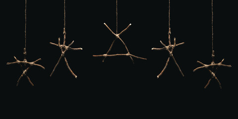 Witchcraft sticks symbols. Magic occult symbol. Many totems hanging on dark background. Mysticism...