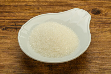 White sugar in the bowl
