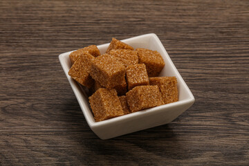 Cane sugar cubs in the bowl