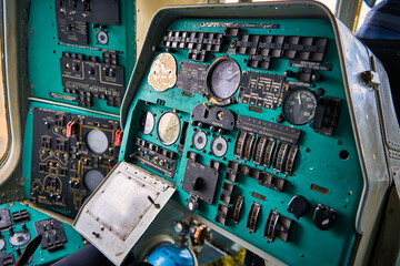 Close-up view of the dashboard in an old plane.