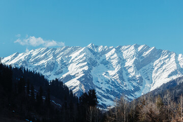 Mountain peak covered by snow as seen from the Solang Valley in Manali, Himachal Pradesh, India