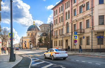 Sorrowful Church and a taxi on Bolshaya Ordynka Street in Moscow