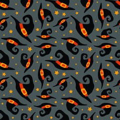 Halloween funny wizard hat and stars seamless pattern. Vector illustration.