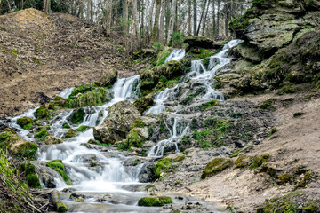 Kazu grava waterfall on the forest river in  Latvia