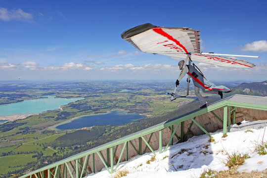 TEGELBERG, GERMANY - MAY 16: Competitor Ievgen Lysenko from Ukraine of the King Ludwig Championship hang gliding competitions takes part on May 16, 2012 in Tegelberg, Germany