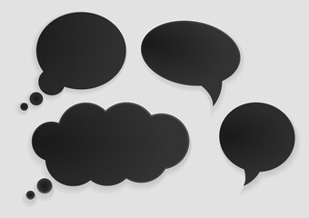 Black paper cut speech bubbles.