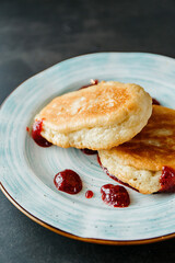 Pancakes with homemade strawberry jam. Beautiful photo for the restaurant menu