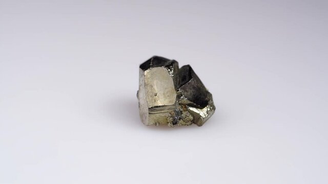 natural silver pyrite gemstone on the white turning table