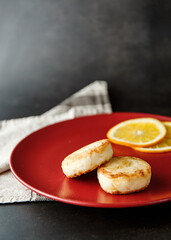 Cheesecakes with orange zest. Delicious healthy cottage cheese breakfast