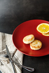Cheesecakes with orange zest. Delicious healthy cottage cheese breakfast