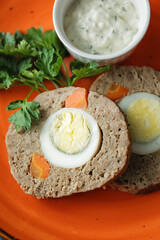 Meatloaf with egg inside. Boiled egg baked in minced meat
