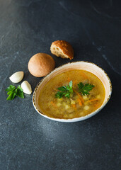
Delicious lunch, Light chicken soup with vegetables. Chicken broth with vegetables. Beautiful still life, photo for the menu
