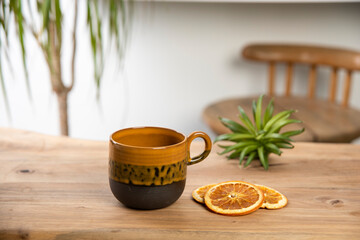 cup of coffee on wooden table