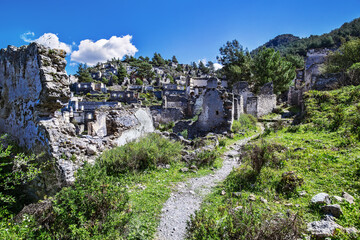 Fototapeta na wymiar The abandoned Greek Kayakoy Town, also known as Karmilissos or Ghost Town. Fethiye, Mugla Province, southwestern Turkey. Mediterranean coast.