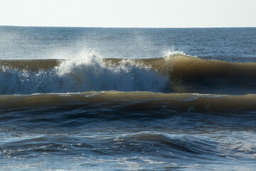 Ocean waves in the sunlight