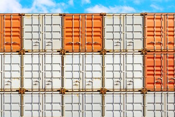 Colorful stack of container shipping at dockyard