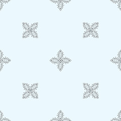 Seamless pattern with black  flowers and leaves on a blue background. Suitable for fabric, wrapping paper, wallpaper, bags, clothes, dishes, cases on smartphones and tablets, wallets.