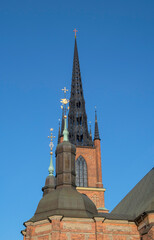 Fototapeta na wymiar The church Riddarholmskyrkan on the island Riddarholmen in Stockholm a sunny spring morning