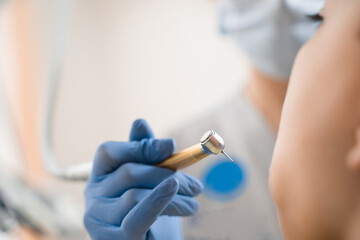 Obraz premium Dentist drill tooth. Stomatology procedure for treatment toothache