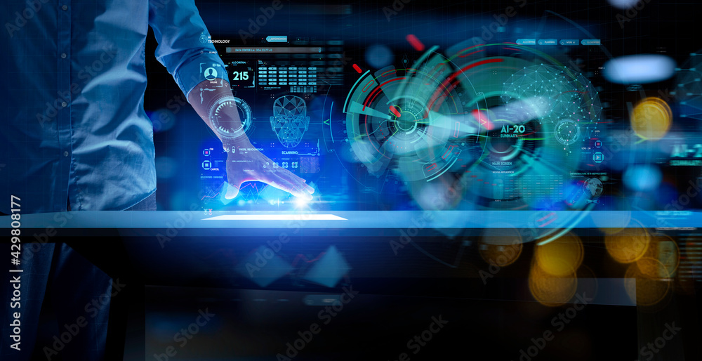 Fototapete Business man pushing on a touch screen interface with table counter futuristic computer with  Ai conputer interface and AR concept.