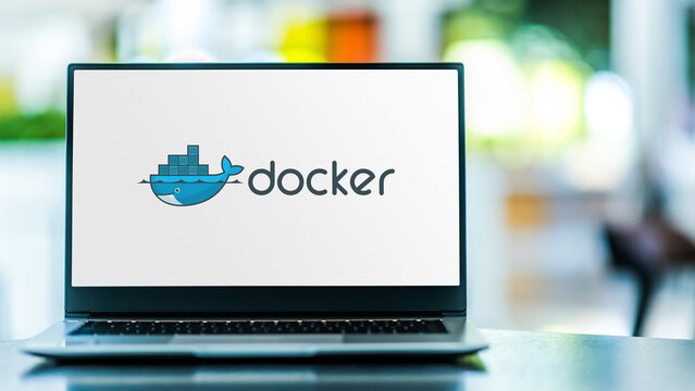 Laptop computer displaying logo of Docker