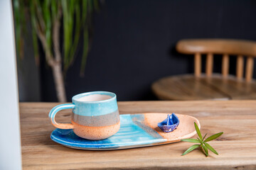 ceramic turkish coffee cups on wooden table