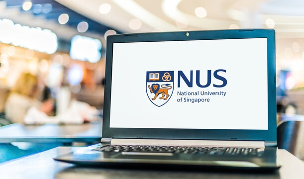 Laptop computer displaying logo of NUS