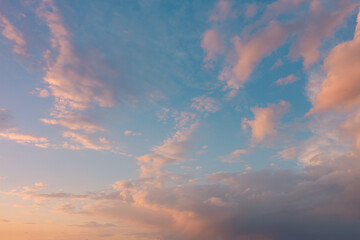 Naklejka na ściany i meble Beautiful evening sky with clouds. Sunset heaven.