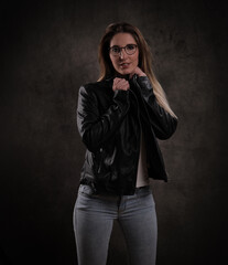 Young attractive woman has a photo shoot in a studio - studio photography