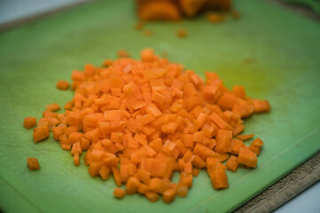 Diced carrots. Close-up. The cooking process. Healthy food.